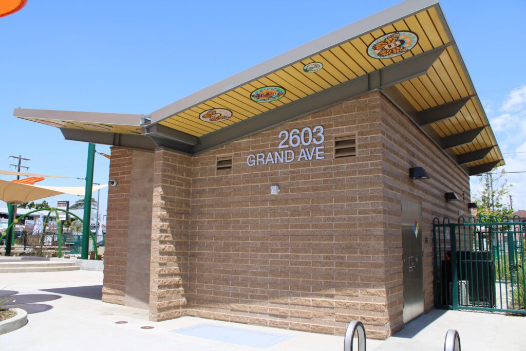 Entrance to a building at 2603 Grand Ave with decorative ceiling tiles.