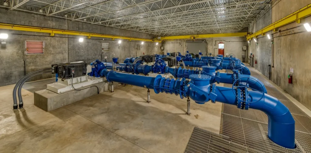 Industrial blue machinery setup inside a large facility.