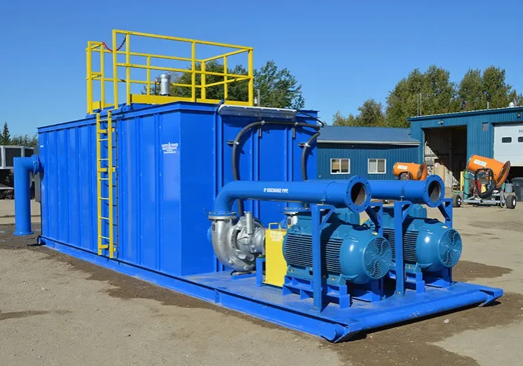 Industrial blue water treatment system with pumps and pipes.